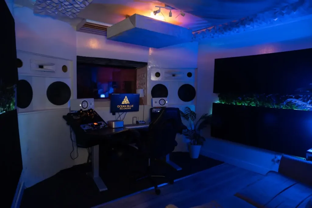 Mixing desk, studio monitors and producer chair in the tracking room at Ocean Blue Recording in Decatur, GA